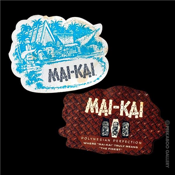 PAIR OF TWO (2) GRAPHIC MAI-KAI DRINK COASTERS.