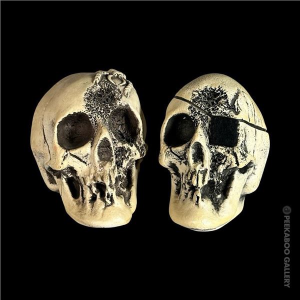 SET OF TWO (2) RANDOTTI DISNEYLAND GLOW-IN-THE-DARK PIRATE SKULLS.