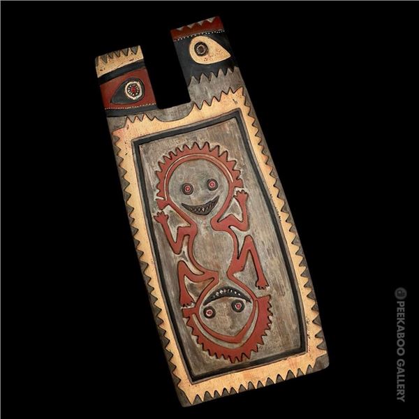 THE FAMOUS OCEANIC ARTS #402 NEW GUINEA "BOY/GIRL" SHIELD CARVING.