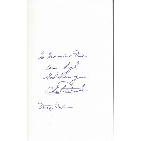 Astronaut Charlie Duke signed space book