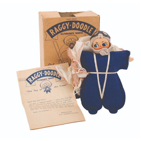 A WWII Raggy Doodle Parachute Trooper Toy.