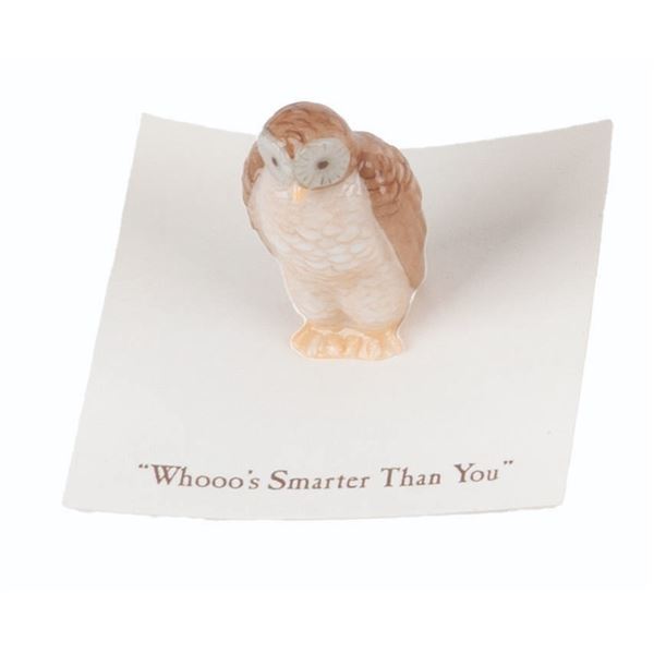 A Mini "Winnie the Pooh" Owl Figurine.