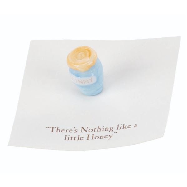 A Mini "Winnie the Pooh" Blue Honey Pot Figurine.