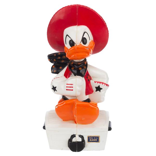 A Cowboy Donald Duck Bank.