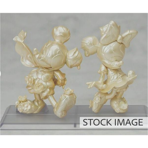 A D23 Mickey & Minnie Mouse 90th Anniversary Figurine Set.