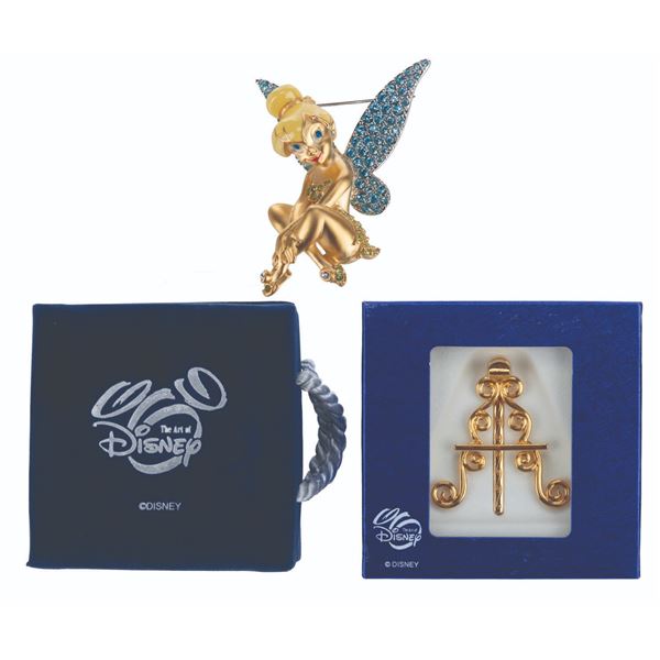 A Swarovski Tinker Bell Pin with Stand.