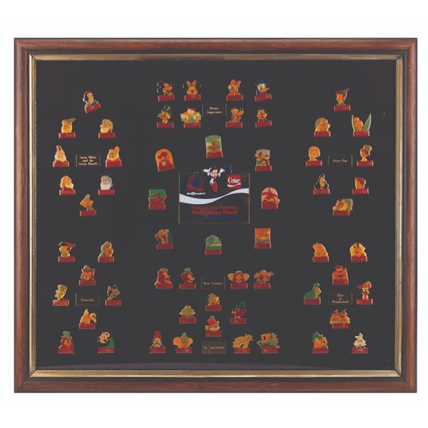 A Framed Set of Walt Disney World 15th Anniversary Coca-Cola Pins.