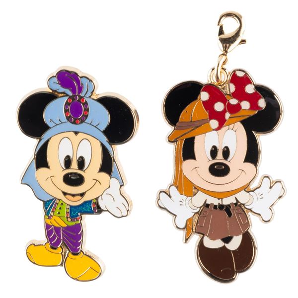 An Abu's Bazaar Pin and Jungle Carnival Charm.
