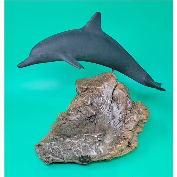 Jumping dolphin statue