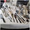 Image 1 : Kitchen Utensils and Decor Including Tools, Glass Bottles, and Strainers