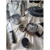 Image 4 : Kitchen Utensils and Decor Including Tools, Glass Bottles, and Strainers