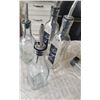 Image 7 : Kitchen Utensils and Decor Including Tools, Glass Bottles, and Strainers