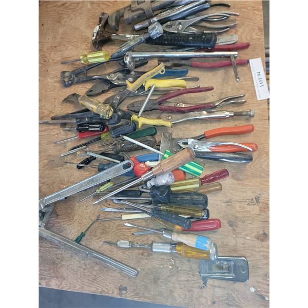 Garage Tools Including Screwdrivers, Pliers, and Miscellaneous Hand Tools