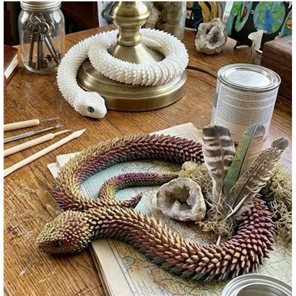 2 3D Printed Snake Face Decor Pieces
