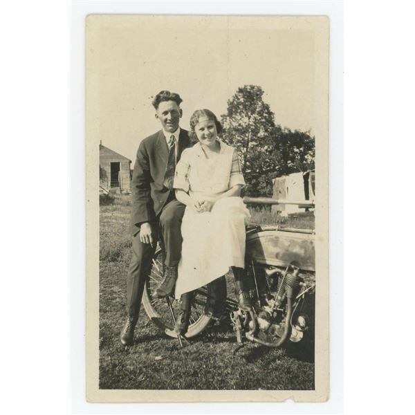 Couple on Early Harley Davidson Motorcycle Photo
