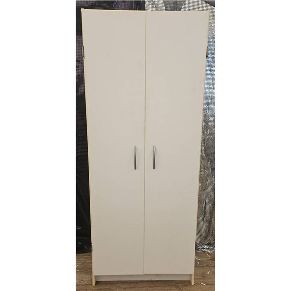 White Wooden Storage Cabinet with Ceramic Dinnerware and Cookbooks