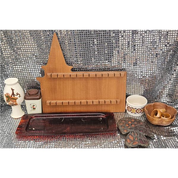 Decorative Items Including Wooden Rack, Pottery, and Trivets