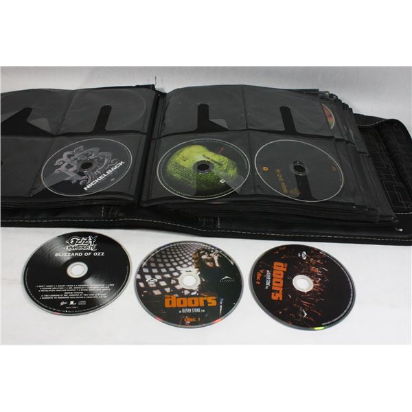 BINDER OF DVD'S AND CDS