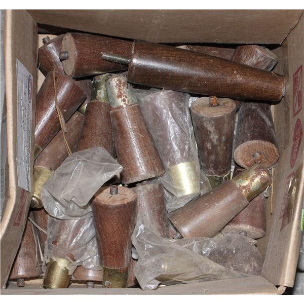 LARGE BOX OF FURNITURE LEGS