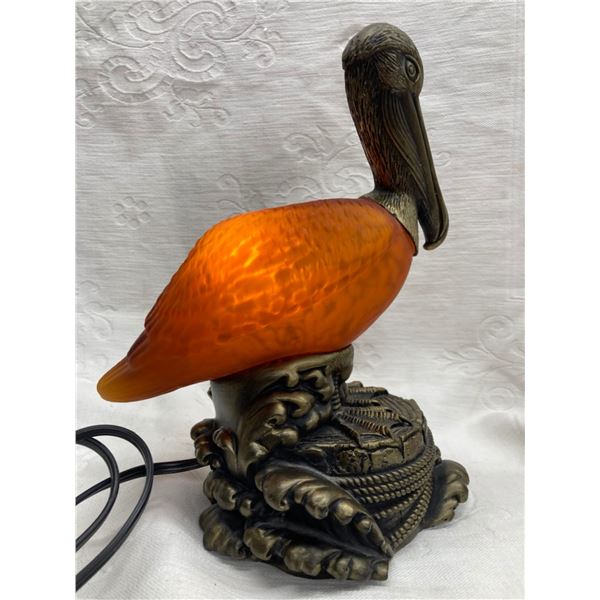 VINTAGE PELICAN COLORED GLASS AND METAL LAMP