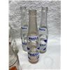 Image 12 : COLLECTION OF VINTAGE SODA POP BOTTLES INCLUDES SEVERAL BRANDS FROM THE MID-20TH CENTURY