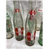 Image 6 : COLLECTION OF VINTAGE SODA POP BOTTLES INCLUDES SEVERAL BRANDS FROM THE MID-20TH CENTURY