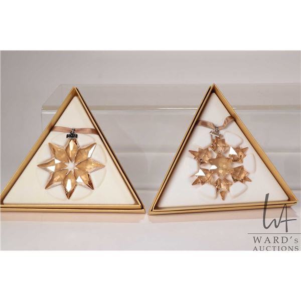 Four Swarovski Crystal collectible snowflakes including 3 X Swarovski SCS including two 2010 and one