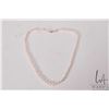 Image 1 : Strand of individually knotted genuine pearls with 14kt gold clasp, 18" in length