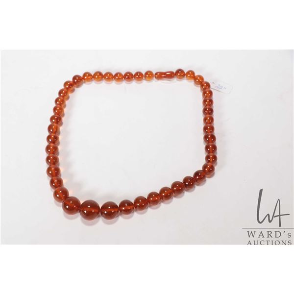 Vintage beaded Baltic amber/ or amber like necklace, 22" in length