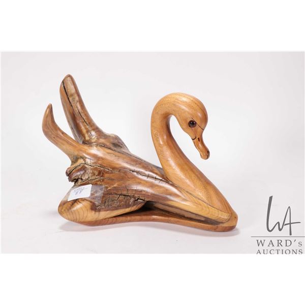Noble E. Needham "Tundra Swan" drift wood carved swan, signed by artist under base, 10" in length