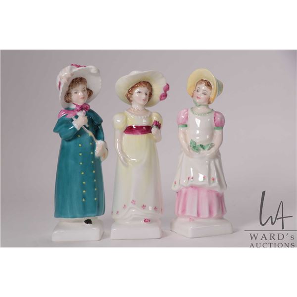 Three Royal Doulton Kate Greenaway collectible figurines including Emma, Lori and Carrie