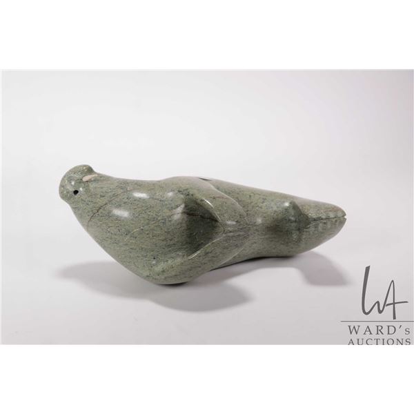 Inuit green soapstone carving of a walrus, note: missing one tusk, 9" in length