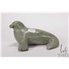 Image 1 : Inuit green soapstone carving of a seal, signed in syllabics and dated 1992, 7" in length