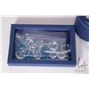 Image 2 : Four Swarovski crystal clamshells including 2 X 833506 ( one without box) plus 833575 and 844184