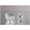 Image 1 : Two Swarovski crystal figures including "Jumping Carp" 211743, 1 1/4" and "Hermit Crab" 671837, 1 1/