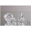Image 2 : Two Swarovski crystal figures including "Jumping Carp" 211743, 1 1/4" and "Hermit Crab" 671837, 1 1/