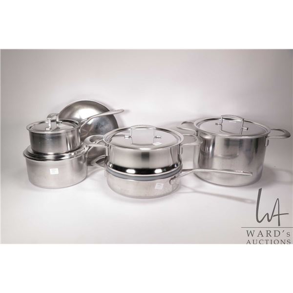 Set of Zwilling J.A. Henkels stainless cookware including stock pot, steamer, two sauce pans and two
