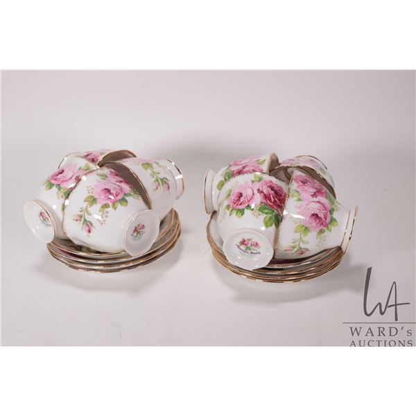 Eight Royal Albert "American Beauty" teacups and saucers