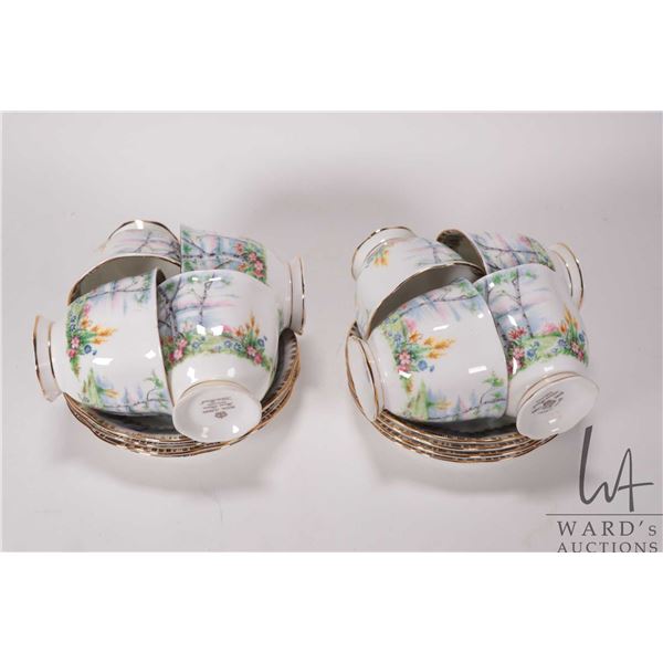 Eight Royal Albert "Silver Birch" teacups and saucers