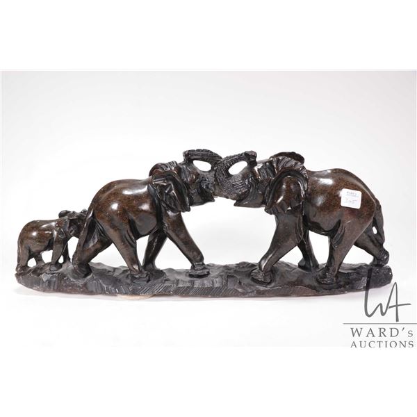 Hand carved soapstone trio of elephants, no artist signature seen, 17 1/2" in length