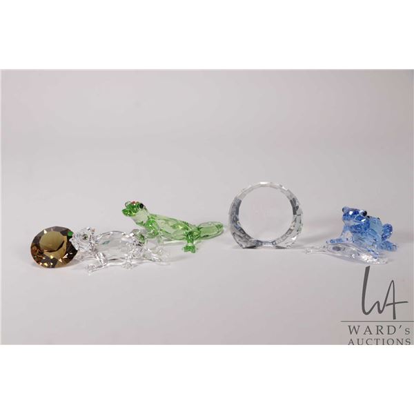 Four Swarovski Crystal figures including Gecko 905541, Chameleon 291134, Salzburg plaque and Blue Da