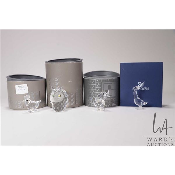 Four Swarovski Crystal figures including Dick Gosling 174963, Quacking Duck 7660, Owl 010016 and Chi