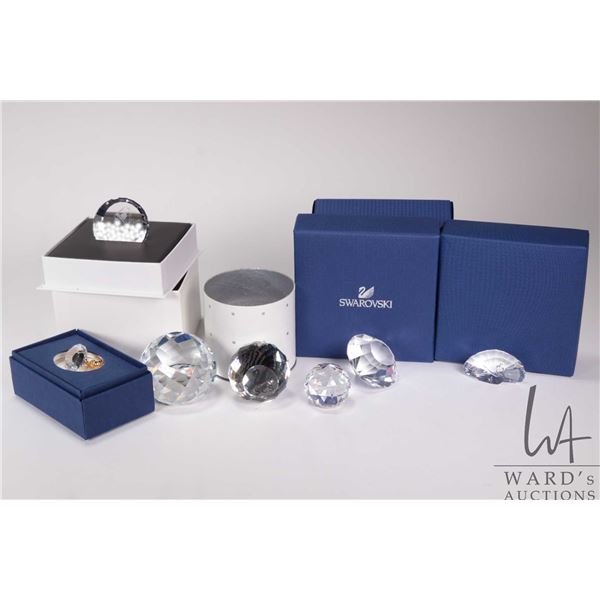 Six Swarovski Crystal plaques and figures including SCS Peacock 5063699, SCS diamond 1096758, perfum