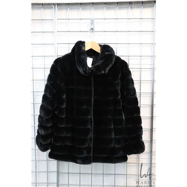 Ladies faux fur reversible jacket, new with some tags still attached, appears size medium