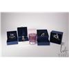 Image 1 : Five Swarovski Crystal collectibles including four Christmas ornaments and a candle