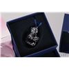 Image 4 : Five Swarovski Crystal collectibles including four Christmas ornaments and a candle