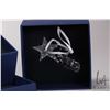 Image 5 : Five Swarovski Crystal collectibles including four Christmas ornaments and a candle
