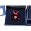 Image 3 : Four Swarovski Crystal collectibles including three Christmas ornaments and a candle