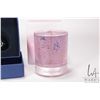 Image 5 : Four Swarovski Crystal collectibles including three Christmas ornaments and a candle