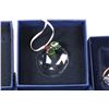 Image 5 : Five Swarovski Crystal collectibles including four Christmas ornaments and a candle